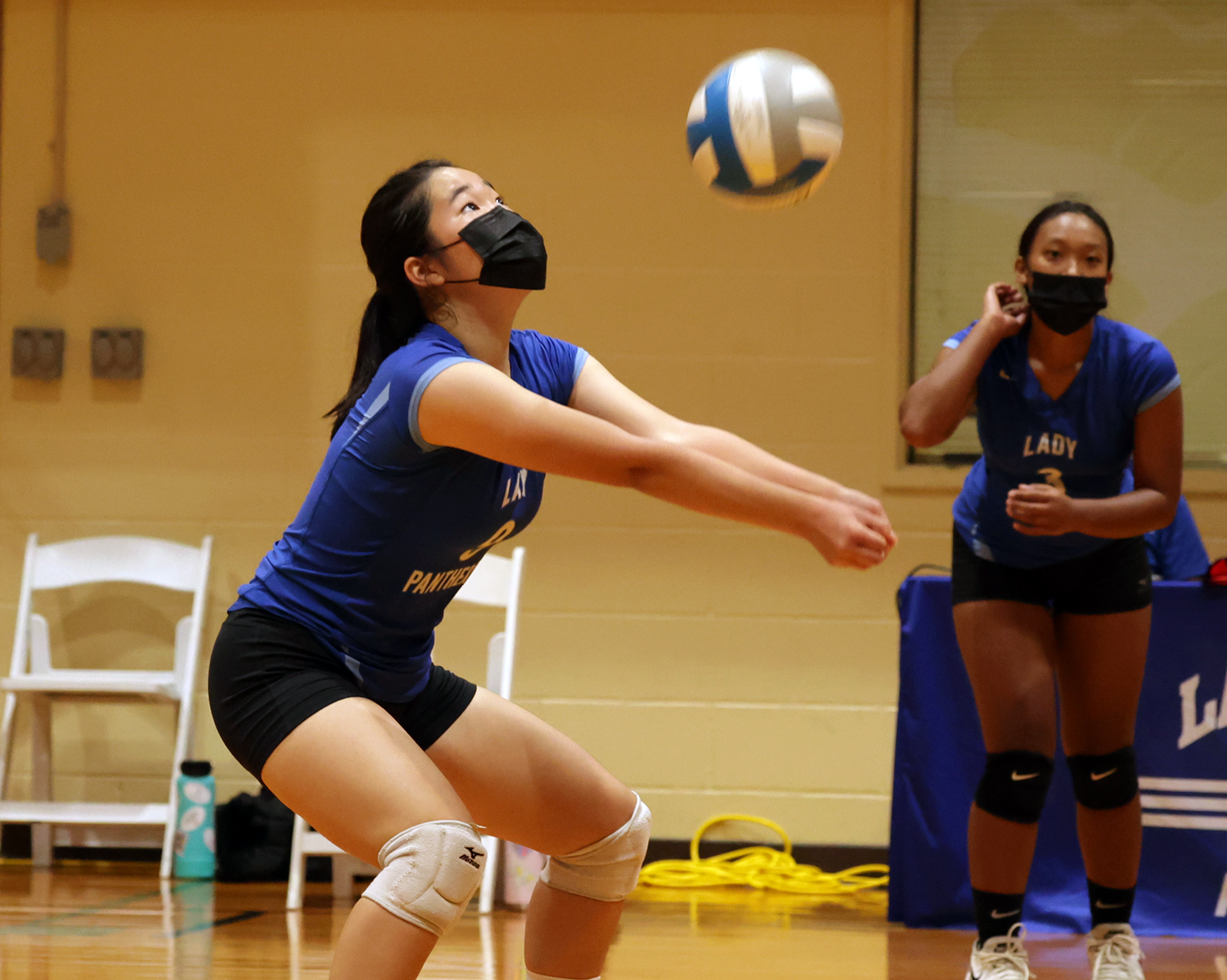 Hannah H. passes the ball to her teammates to set up the next play