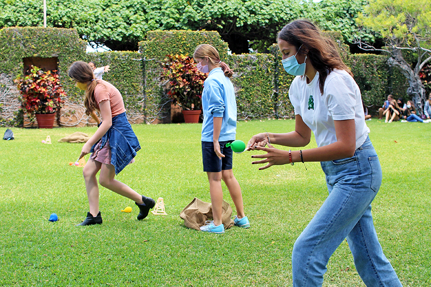 Middle schoolers face off in a relay obstacle course! Who will make it to the finish line without dropping their balloon?