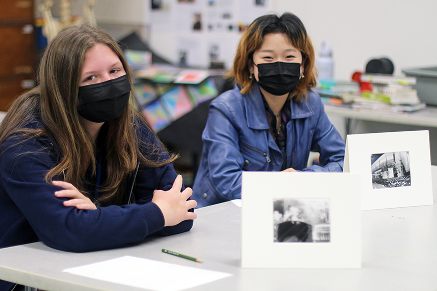 Maila S. and Chloe N. with their matted pinhole photographs.