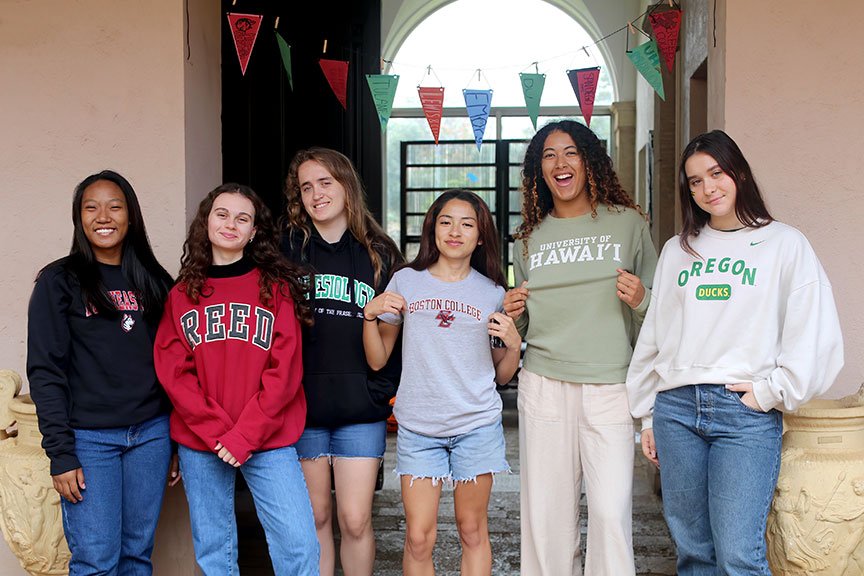 Some members of the Class of 2023 shows off their new school colors.