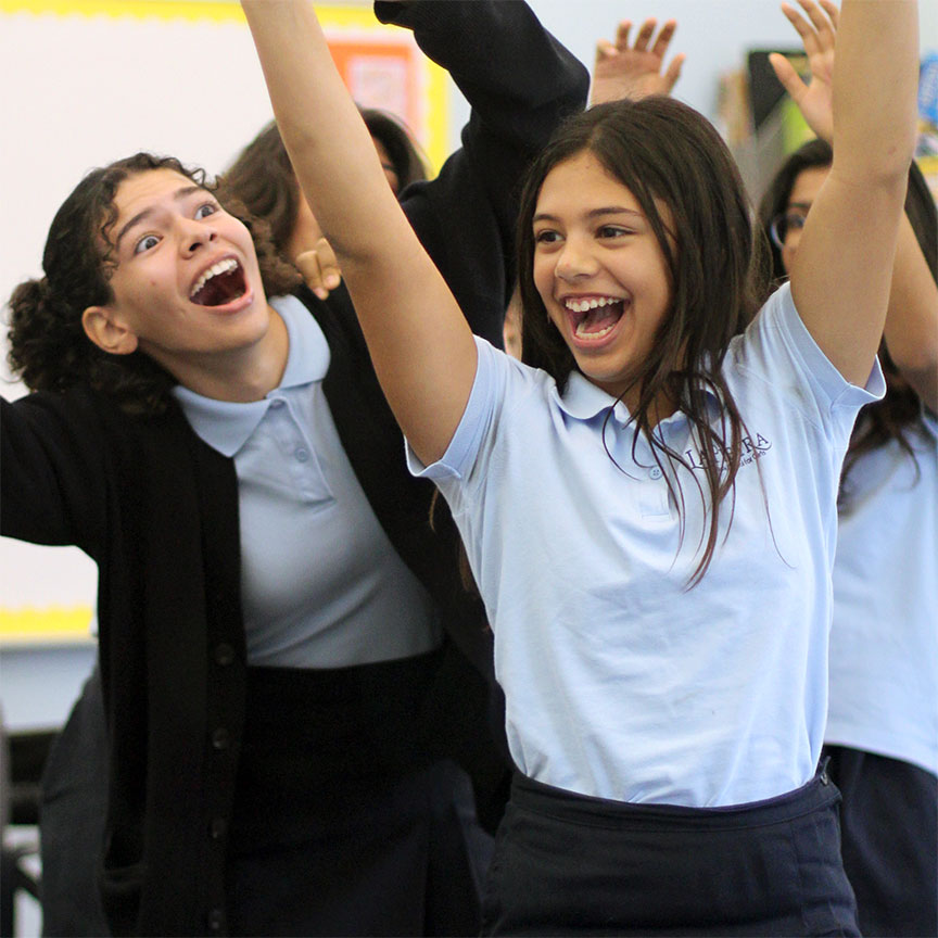 Students acting out a scene in theatre class.